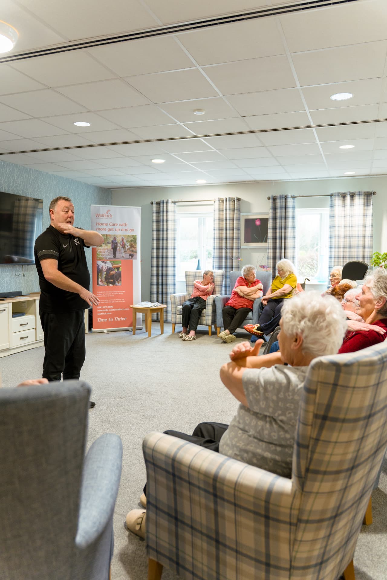 A seated group exercise session at a Walfinch Newcastle Thrive Club