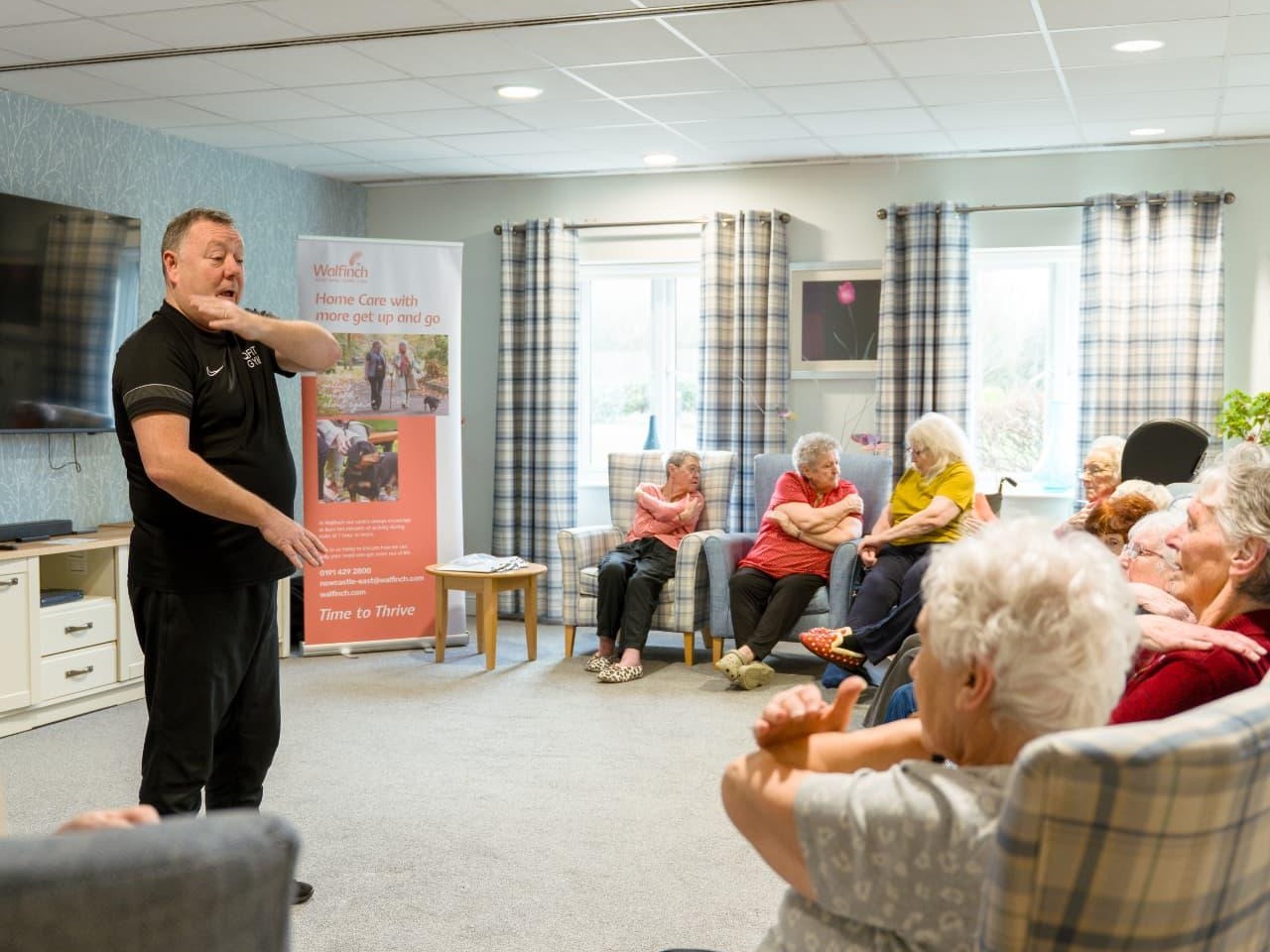 A seated group exercise session at a Walfinch Newcastle Thrive Club